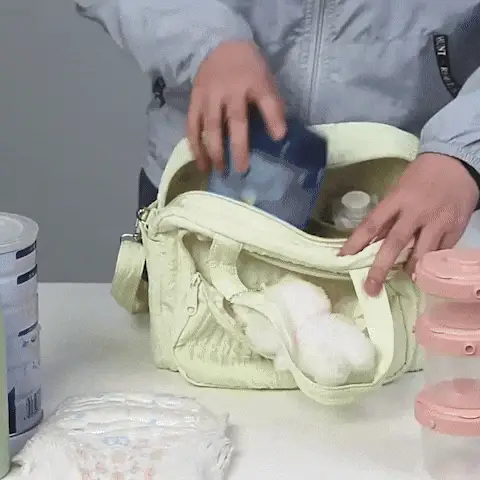 Sac à langer/Sac à couches avec pendentif